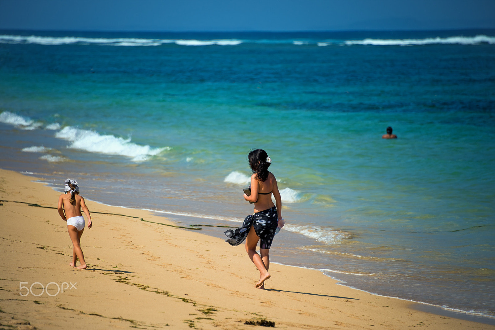 Nikon D4 sample photo. A girl and a child walking along the water's edge of the andaman sea in phuket photography