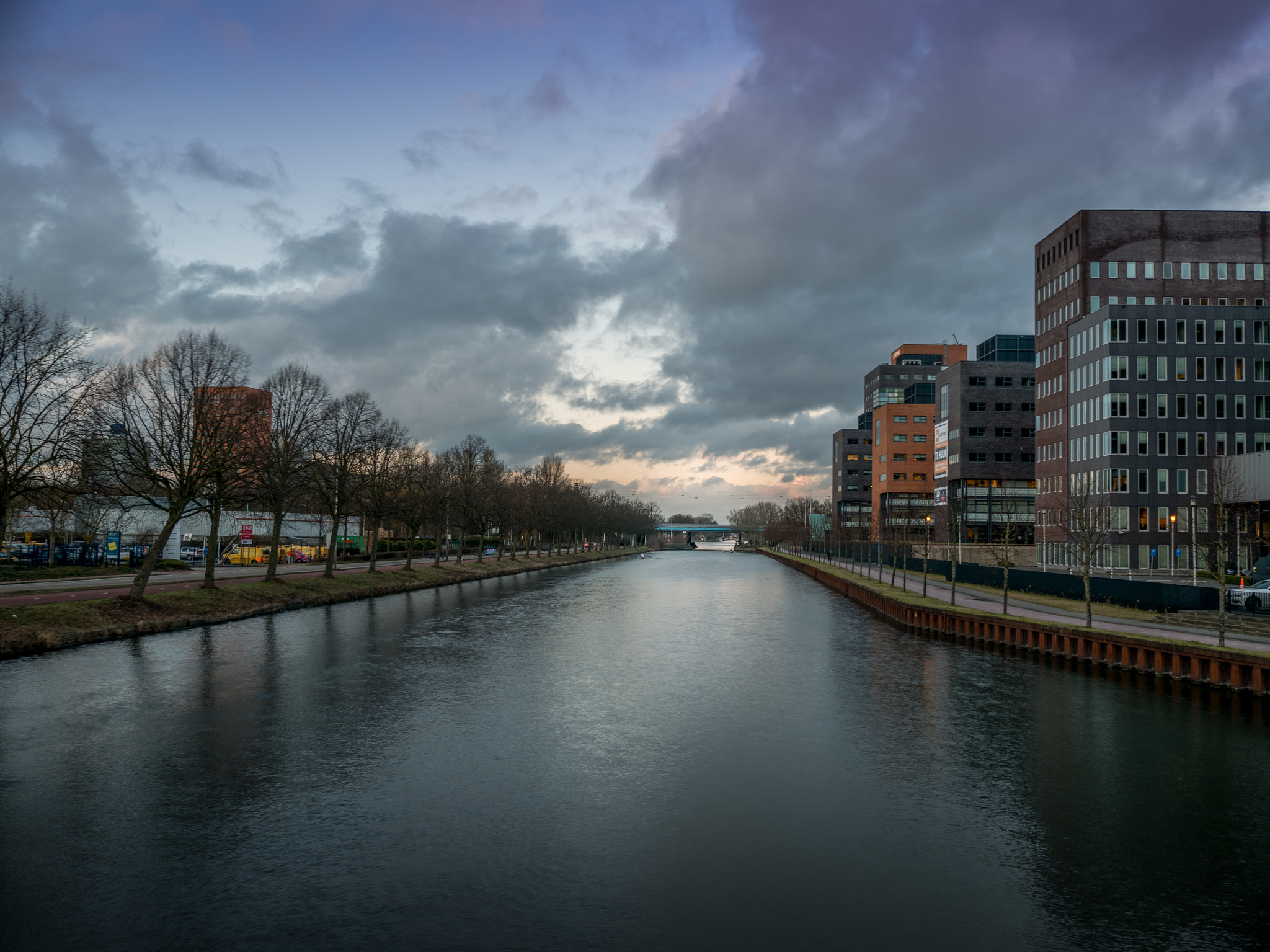 Panasonic Lumix G X Vario 12-35mm F2.8 ASPH Power OIS sample photo. Utrecht riverbank business district photography