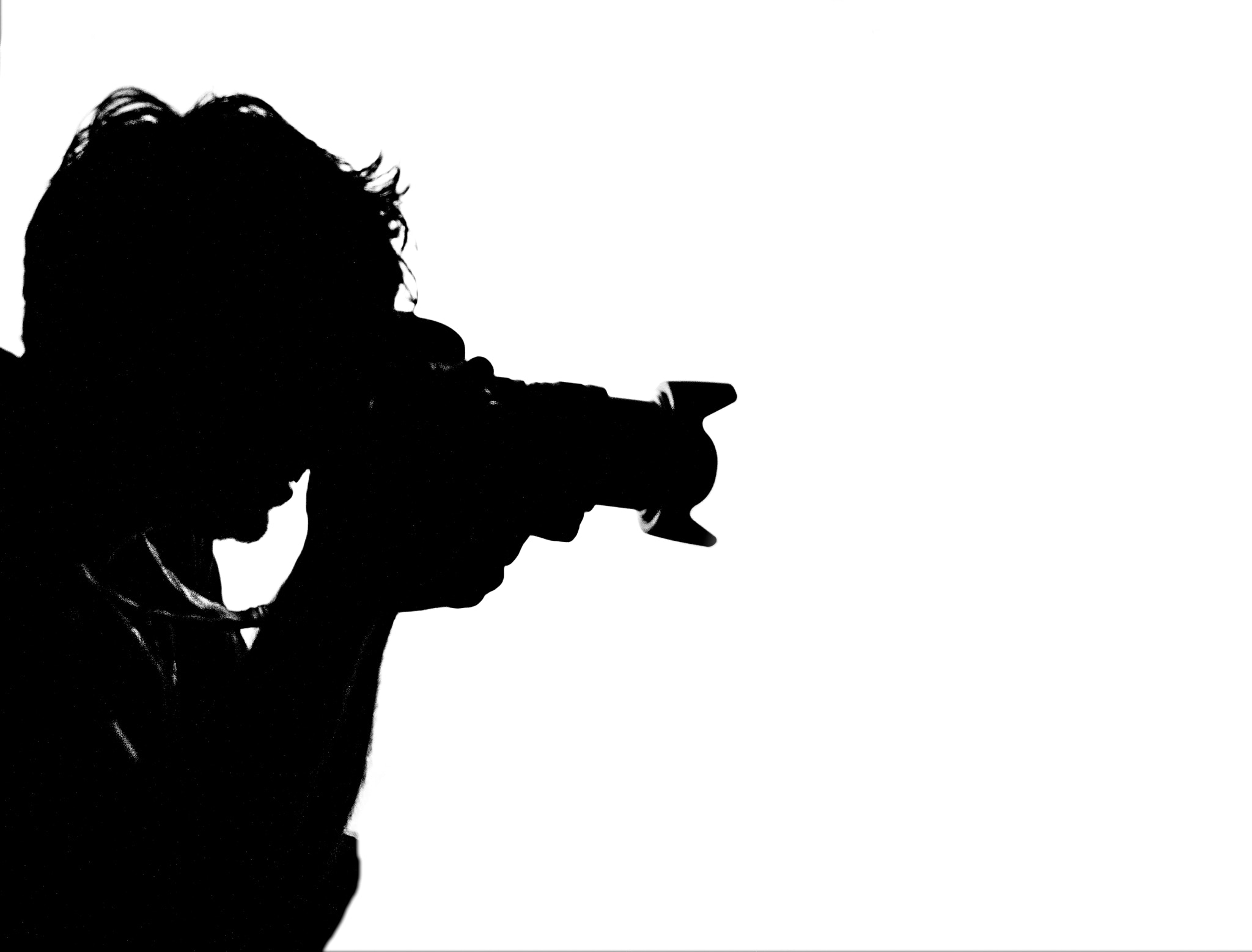 Canon EOS 450D (EOS Rebel XSi / EOS Kiss X2) sample photo. Silhouette side view of photographer photography