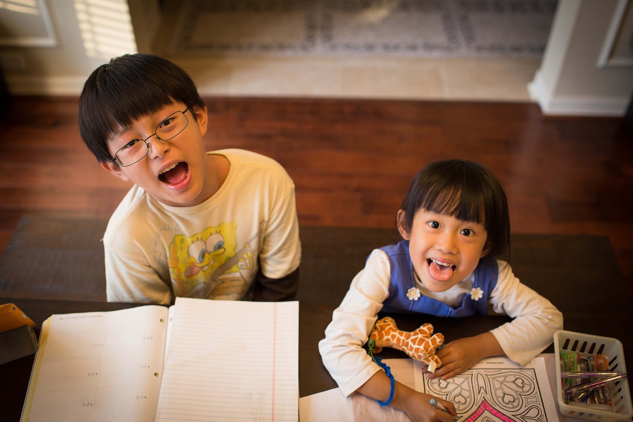 Canon EOS 6D + Canon EF 35mm F1.4L USM sample photo. Happy homework time photography