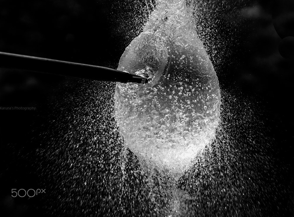 Sony SLT-A58 + Sony DT 50mm F1.8 SAM sample photo. Balloon water burst photography