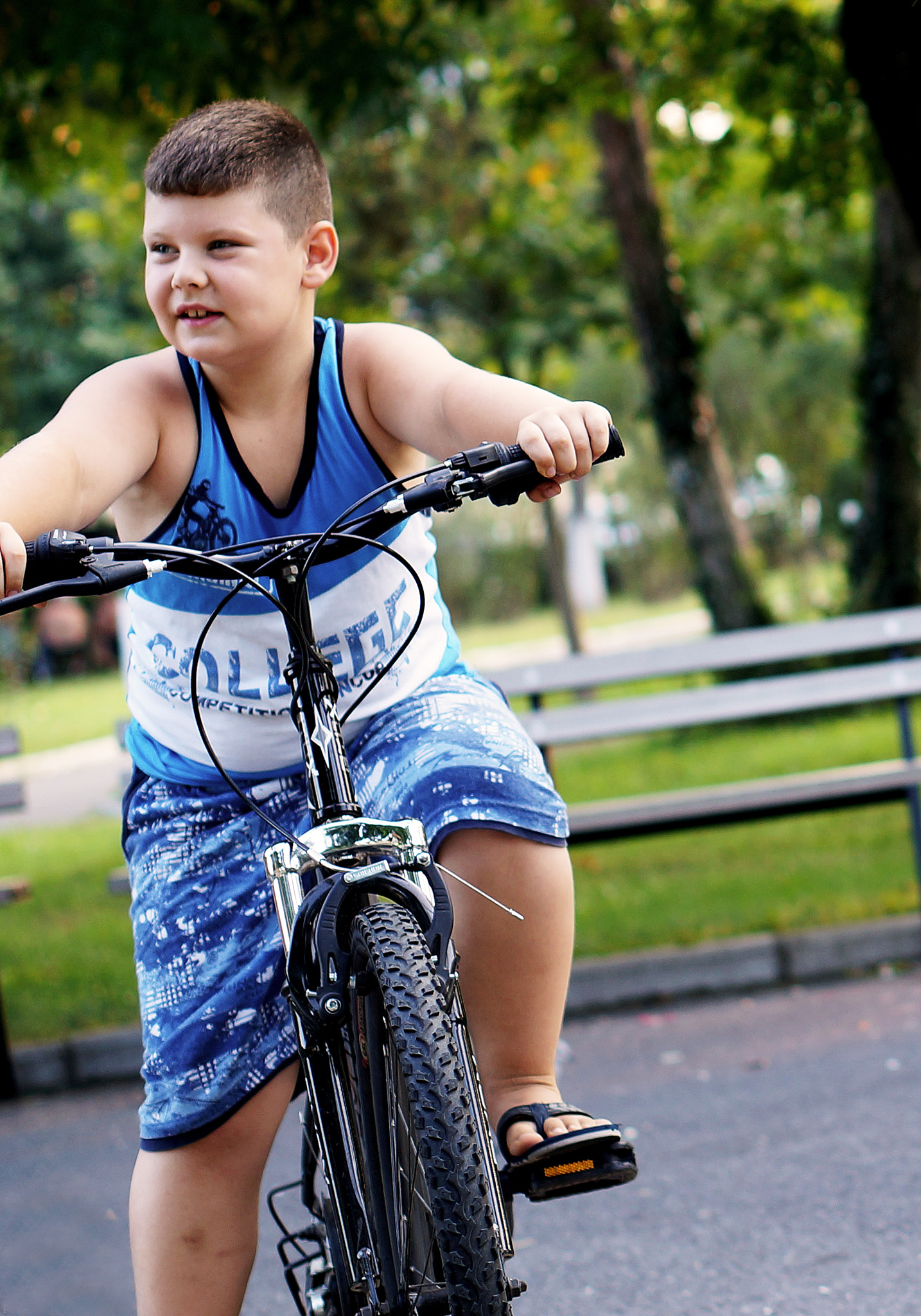 E 50mm F1.8 OSS sample photo. Cyclist photography