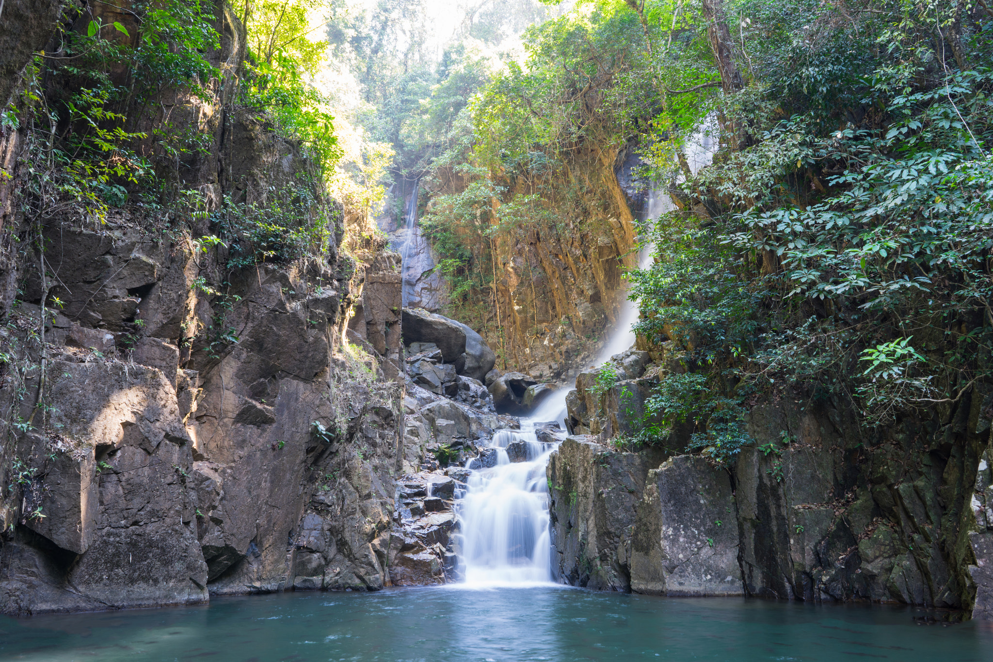 Sony FE 28mm F2 sample photo. Great waterfall in the forest, thailand photography