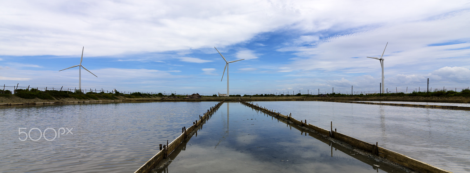 Nikon D810 sample photo. Wind turbines reflected in water in norachcholai sri lanka photography