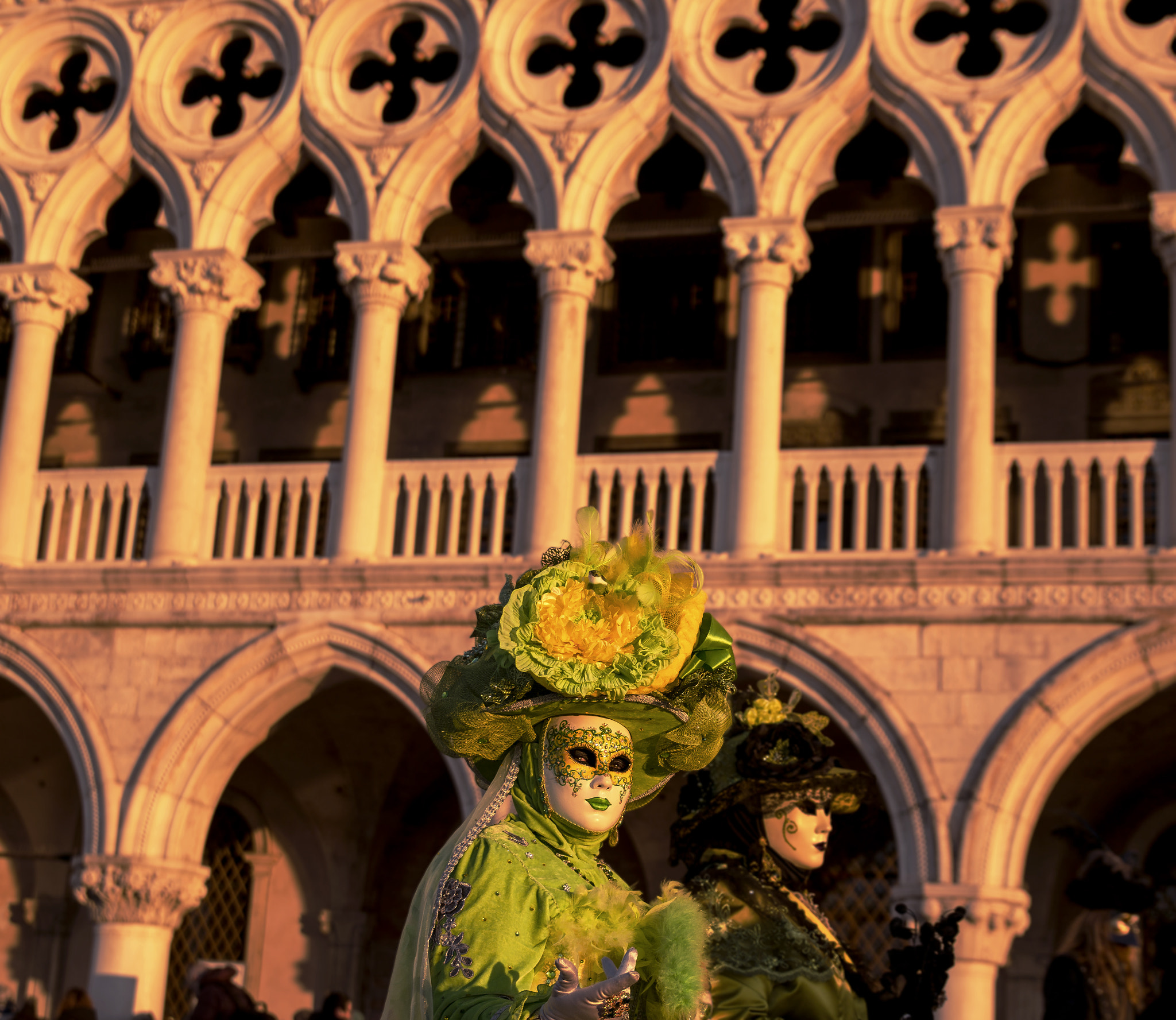 Canon EOS 70D + Sigma 24-70mm F2.8 EX DG Macro sample photo. Walking masks at dawn, carnival in venice photography