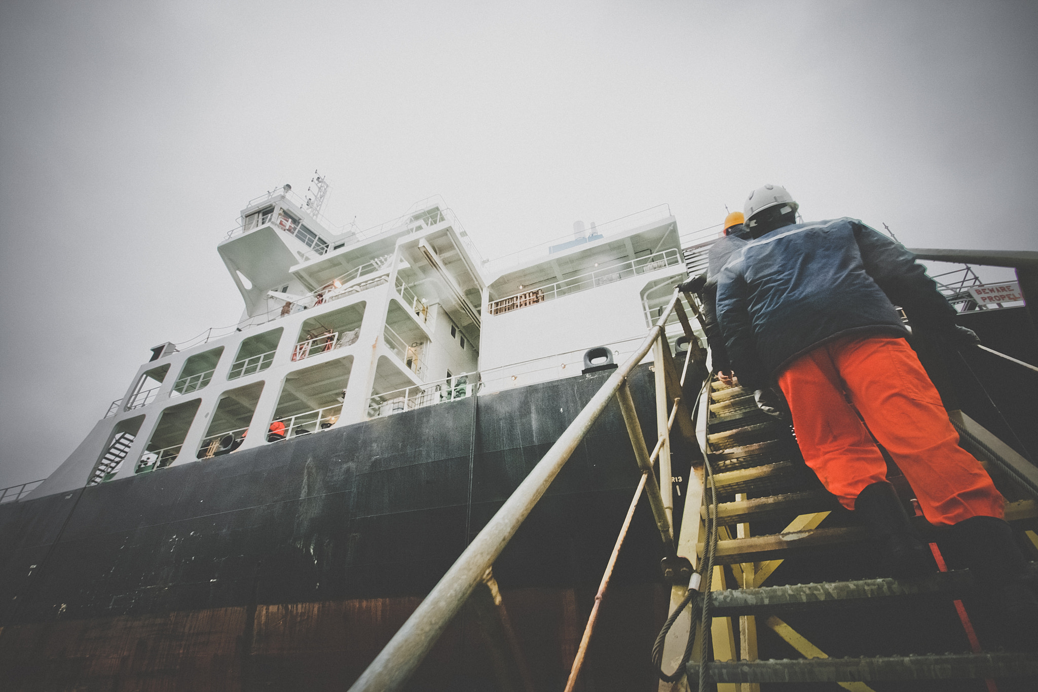 Sigma 10-20mm F3.5 EX DC HSM sample photo. Ship crew climbing stairs photography