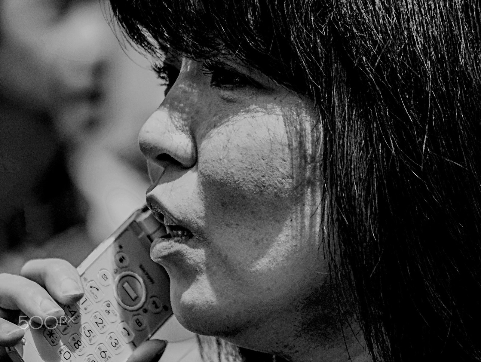 Canon EF-S 55-250mm F4-5.6 IS sample photo. Girl and phone photography