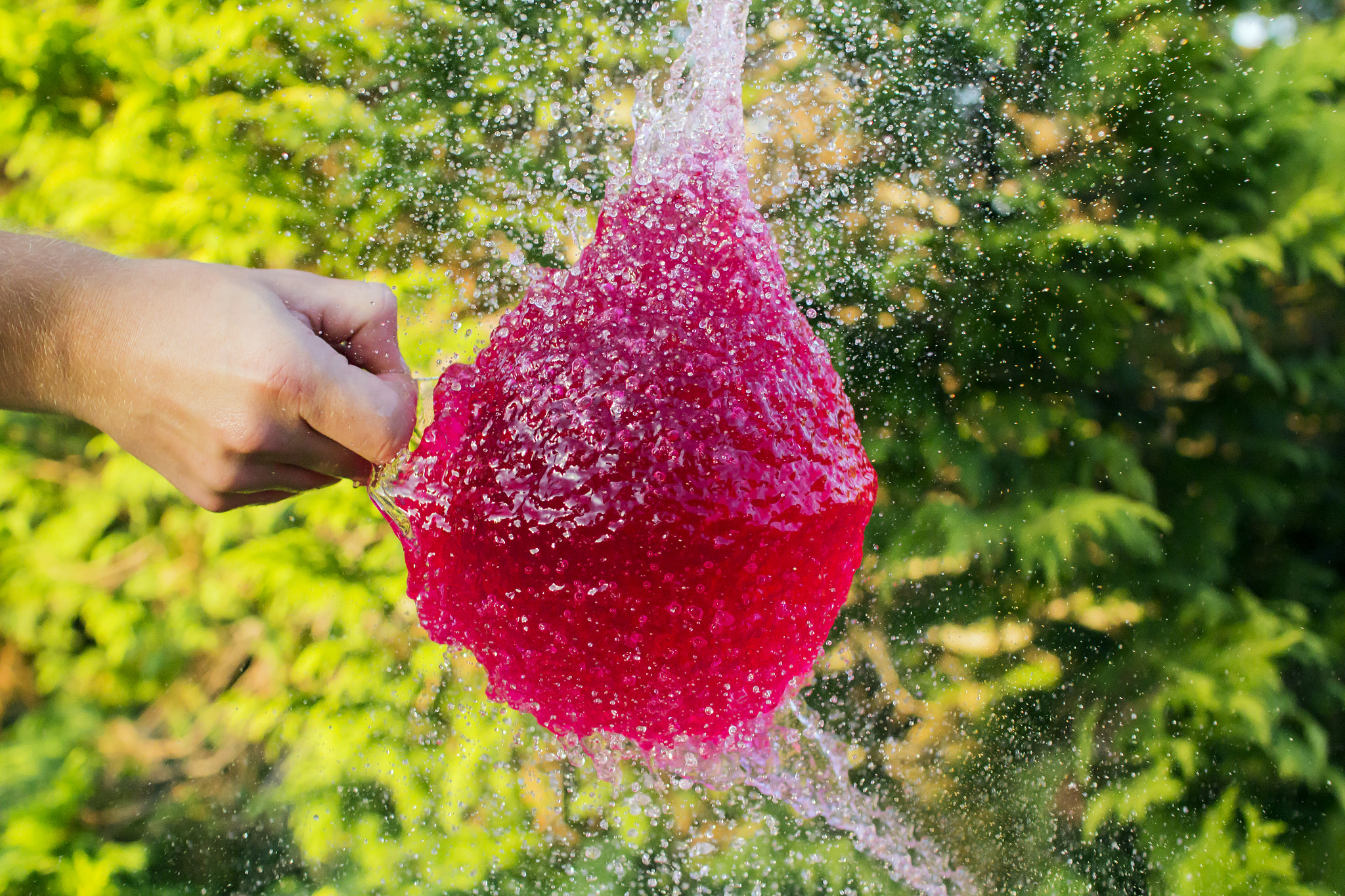 Sigma 30mm F1.4 EX DC HSM sample photo. Water bursting balloon photography