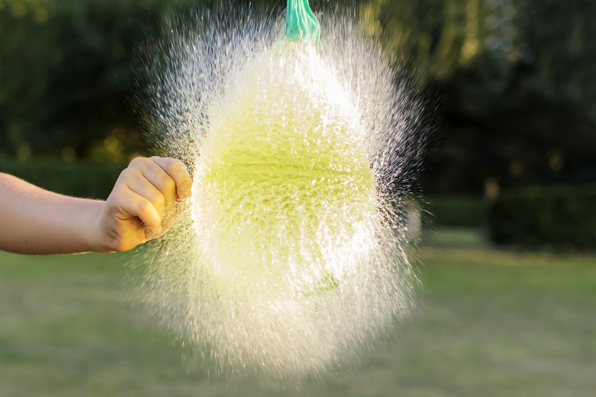 Sigma 30mm F1.4 EX DC HSM sample photo. Water bursting balloon photography