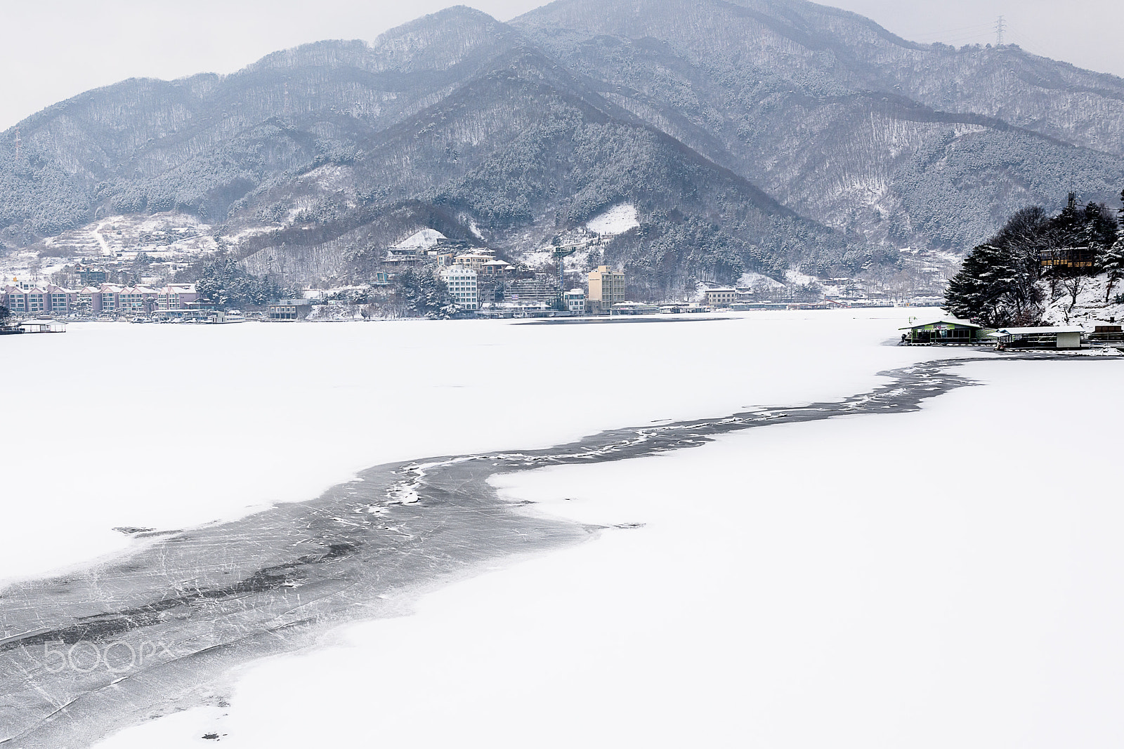 Nikon D810 + Nikon AF Nikkor 35mm F2D sample photo. Ice on snow photography