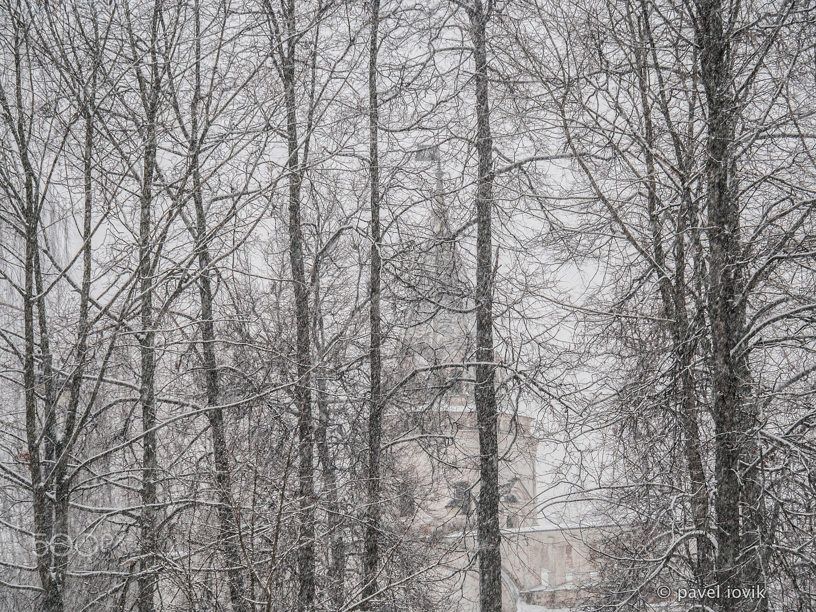 OLYMPUS M.14-150mm F4.0-5.6 II sample photo. Snowfall and bell tower. photography
