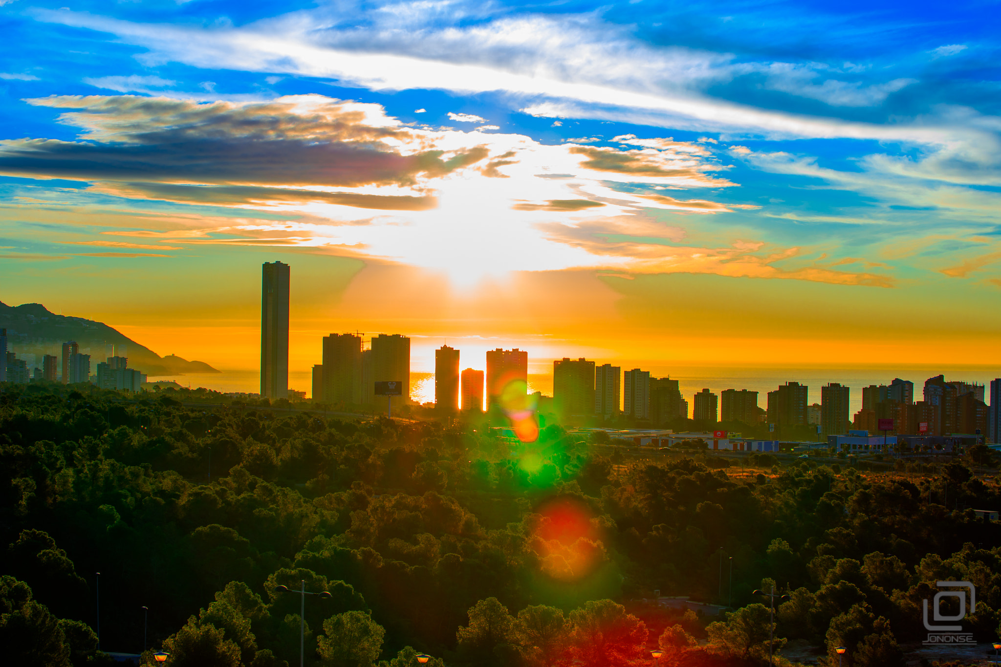 Canon EF 70-300mm F4-5.6L IS USM sample photo. Burning clouds photography