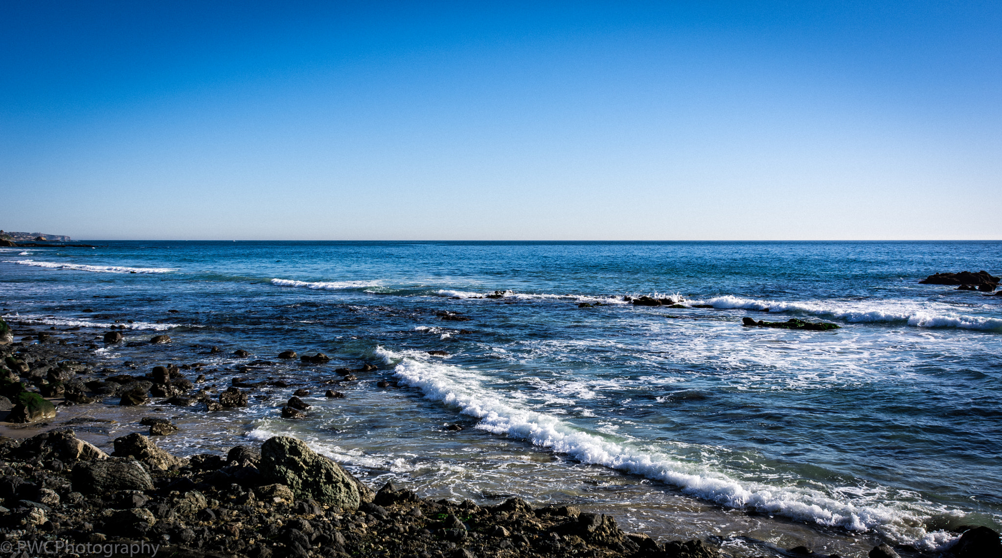 Nikon D7100 + Nikon AF Nikkor 20mm F2.8D sample photo. Laguna cres beach rocks and water photography