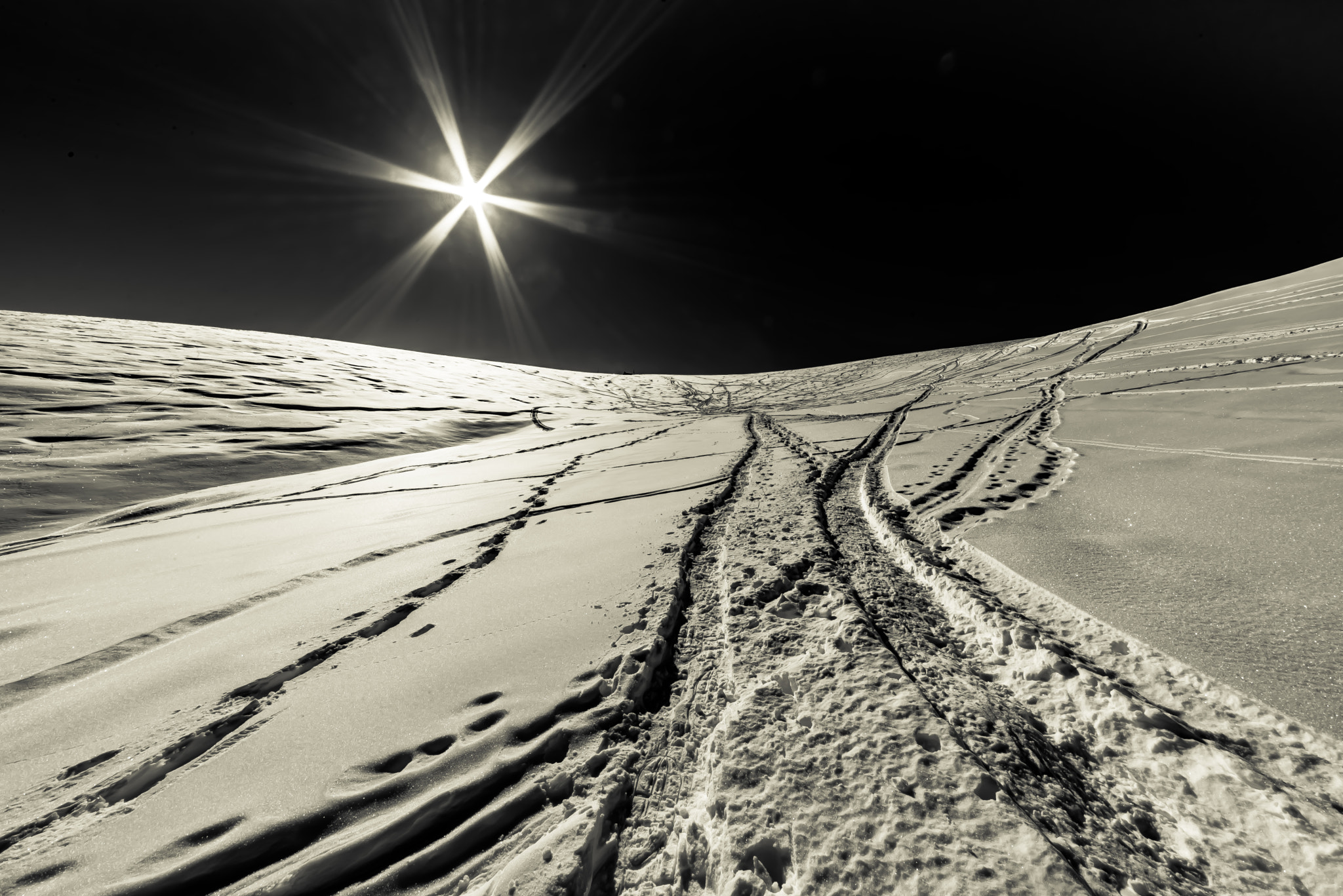 Nikon D610 + Sigma 12-24mm F4.5-5.6 II DG HSM sample photo. Only...tracks in the snow photography