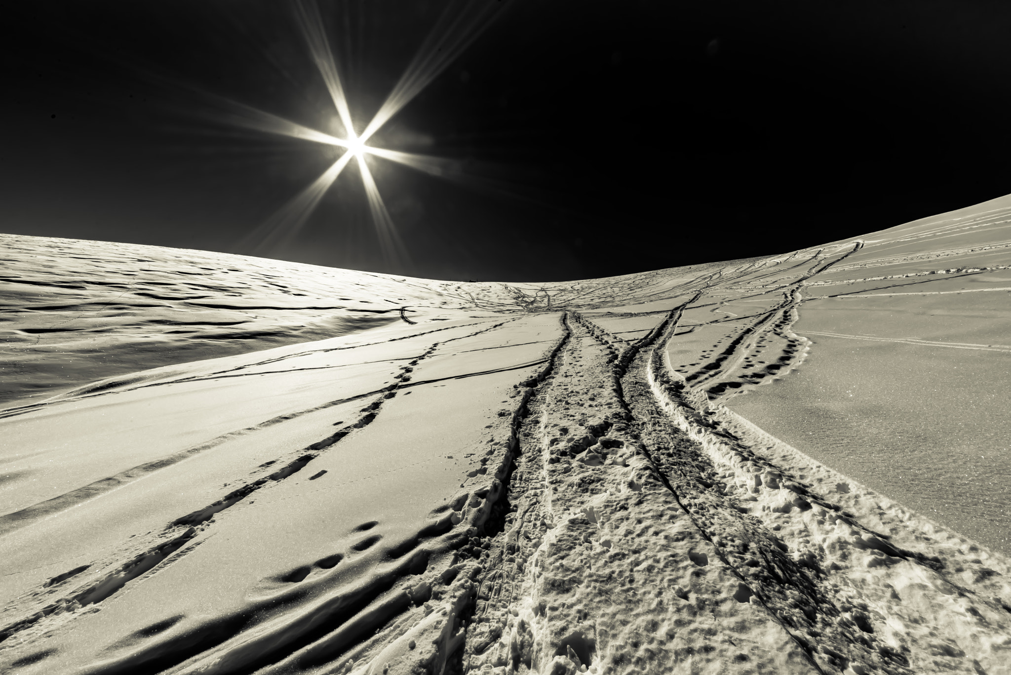 Sigma 12-24mm F4.5-5.6 II DG HSM sample photo. Only...tracks in the snow photography