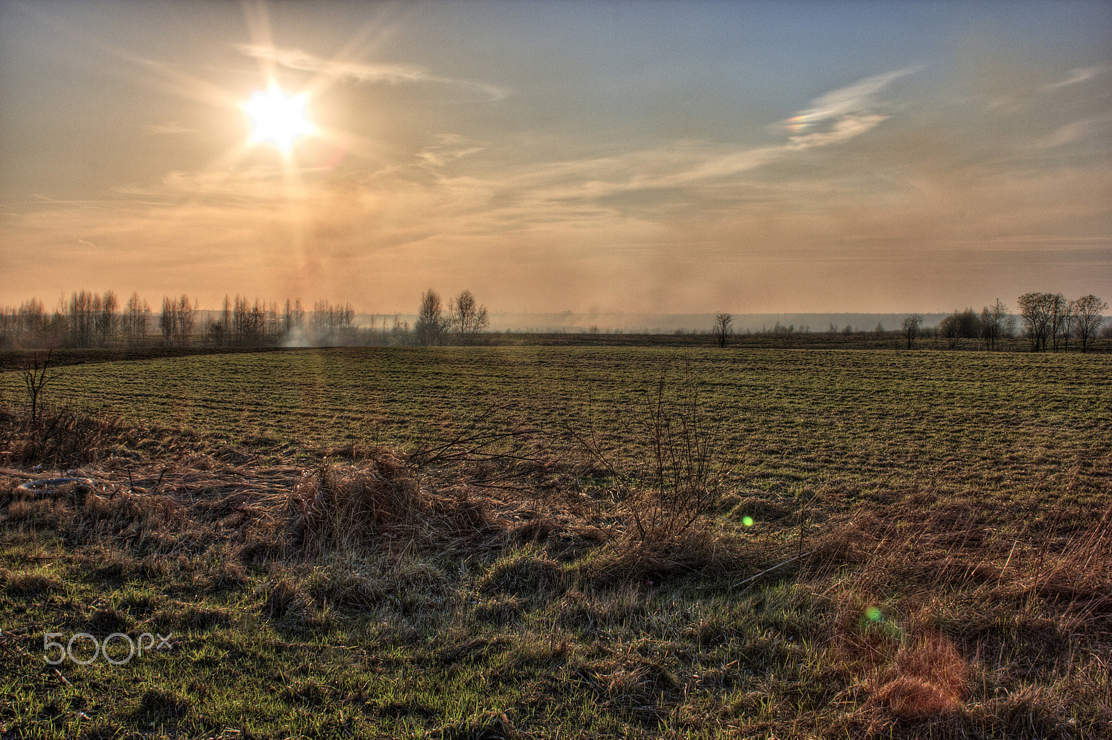 18.00 - 55.00 mm sample photo. Smoke over the field photography