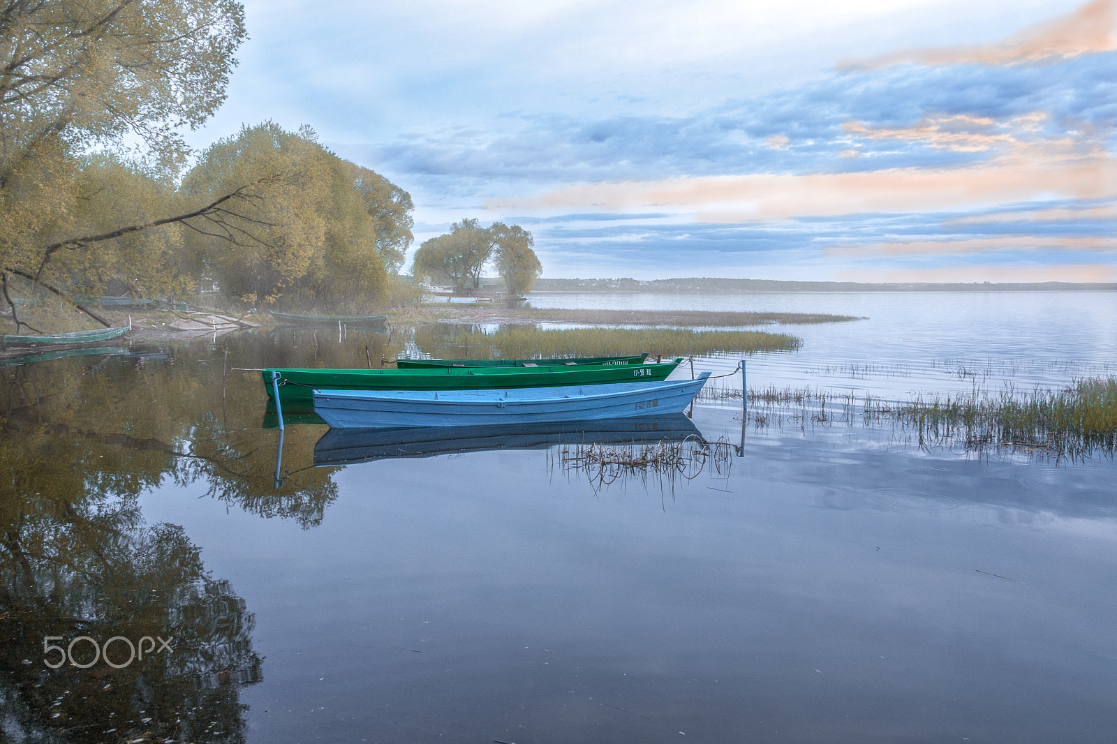 Canon EF 28-135mm F3.5-5.6 IS USM sample photo. Foggy landscape with boats photography