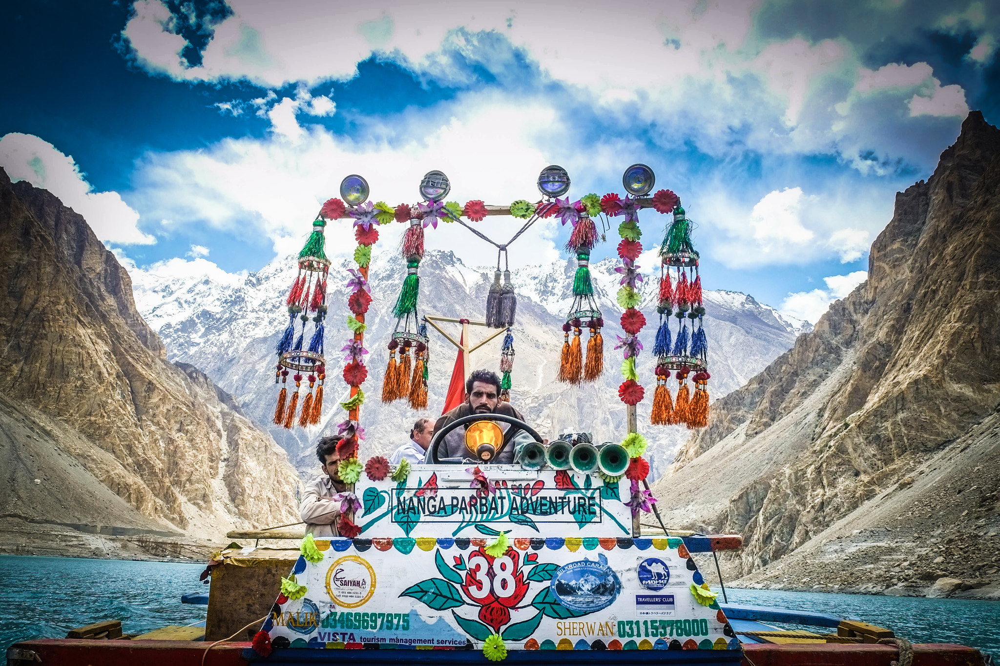 Fujifilm X-Pro1 + Fujifilm XF 18-55mm F2.8-4 R LM OIS sample photo. Boat driver in hunza valley, pakistan photography