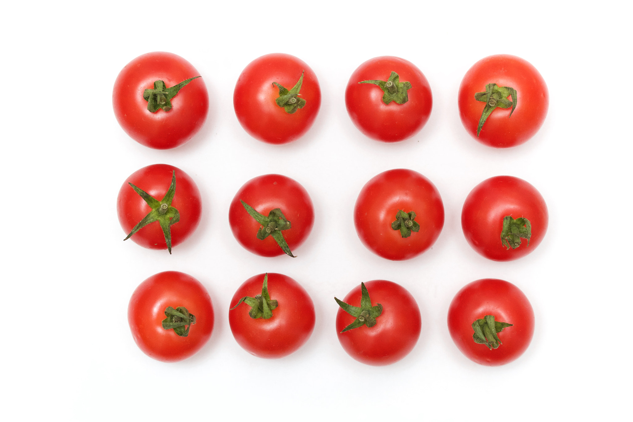 Canon EF-S 60mm F2.8 Macro USM sample photo. Tomatoes almost in line photography