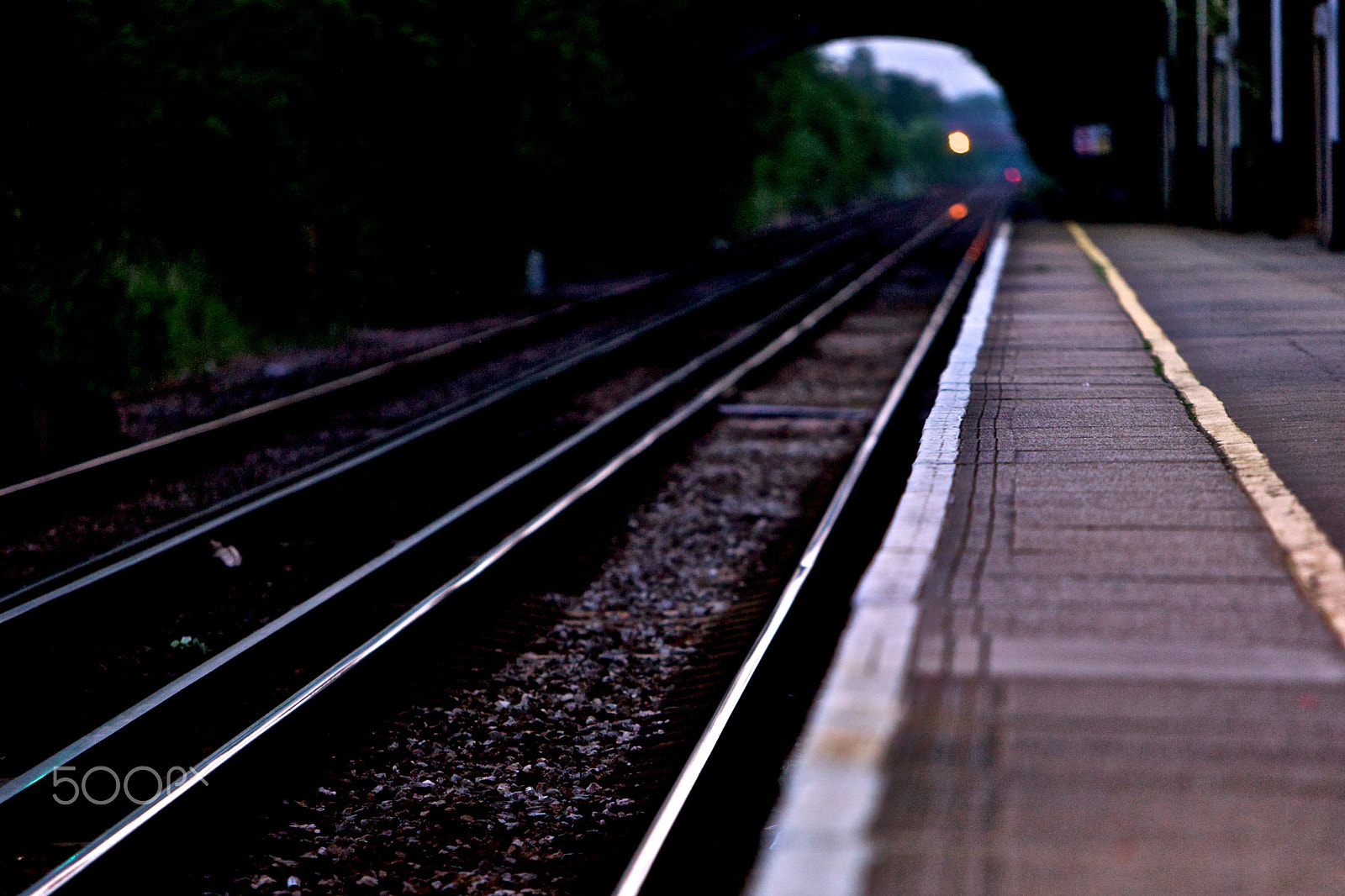 Canon EF 70-200mm F2.8L IS USM sample photo. Ttrain station and tracks at dawn photography