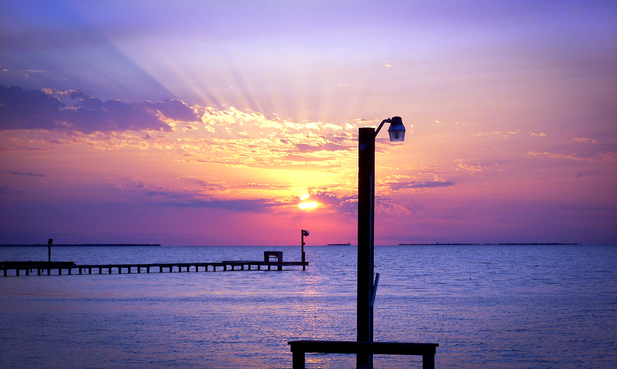 Nikon COOLPIX L11 sample photo. Sunset on galveston bay photography