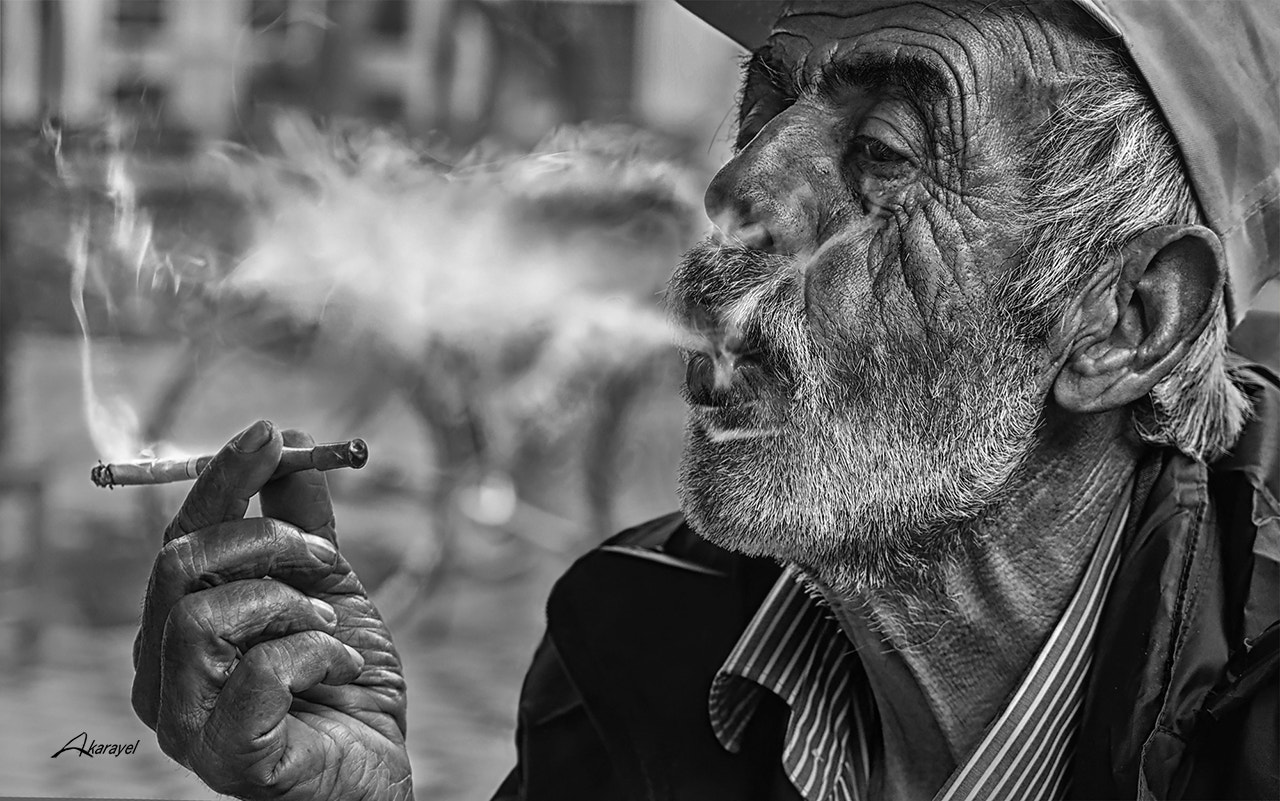 Olympus OM-D E-M10 II + Olympus M.Zuiko Digital ED 12-40mm F2.8 Pro sample photo. Smoke man... photography