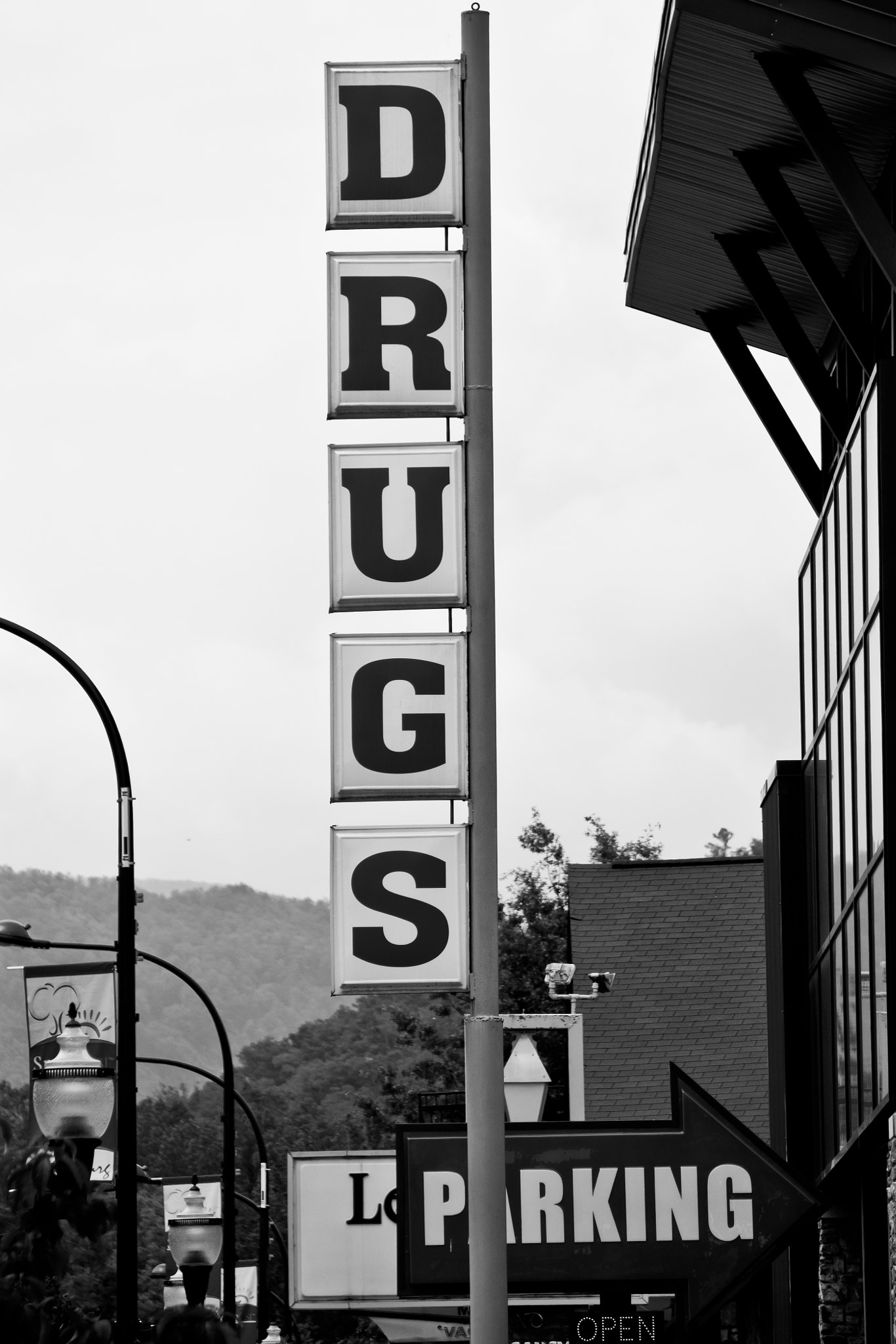 Canon EF-S 55-250mm F4-5.6 IS sample photo. Drugs parking photography