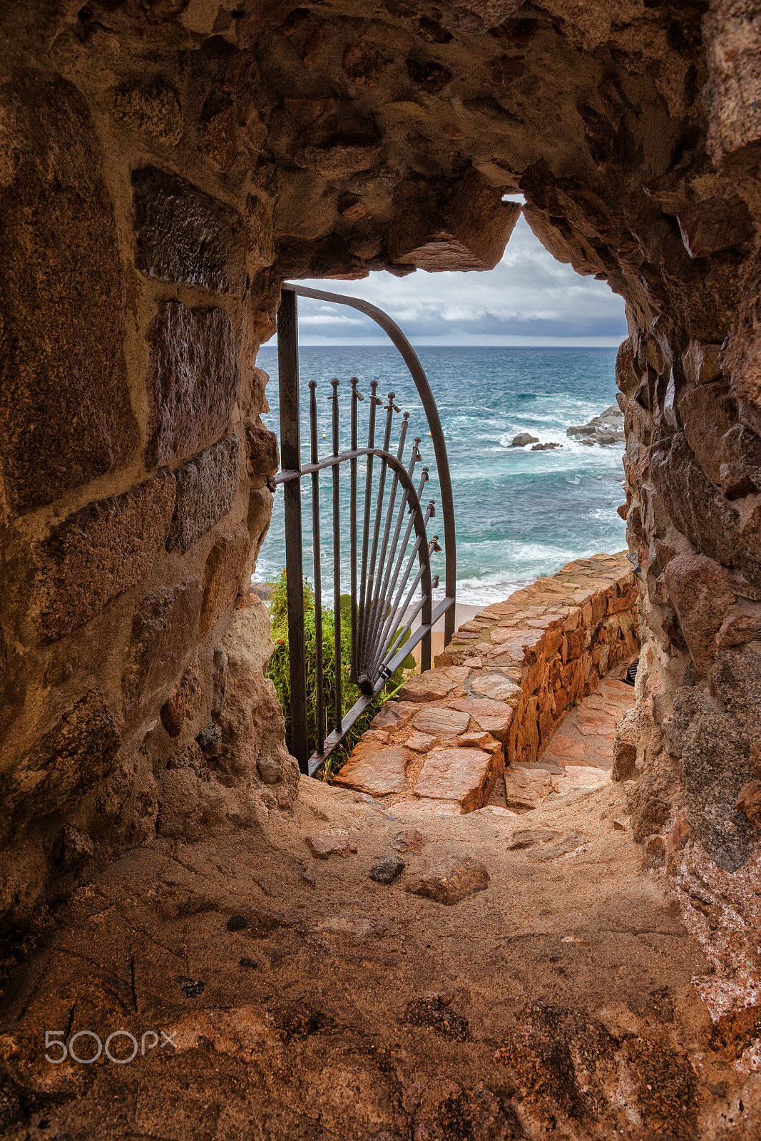 Canon EF 24mm F2.8 IS USM sample photo. Window in medieval wall with view to the sea photography