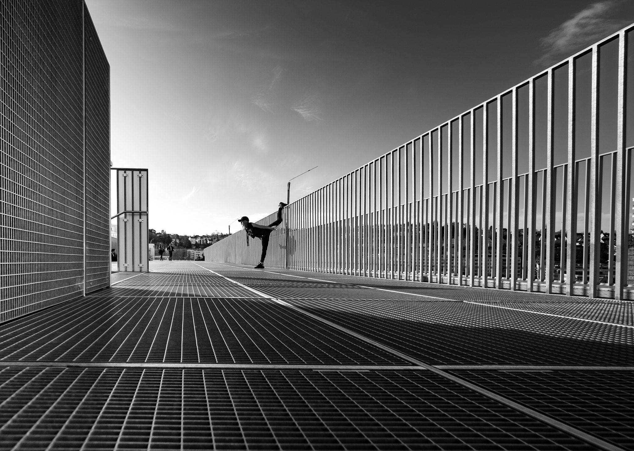 Olympus M.Zuiko Digital ED 7-14mm F2.8 PRO sample photo. Yoga on a railing photography