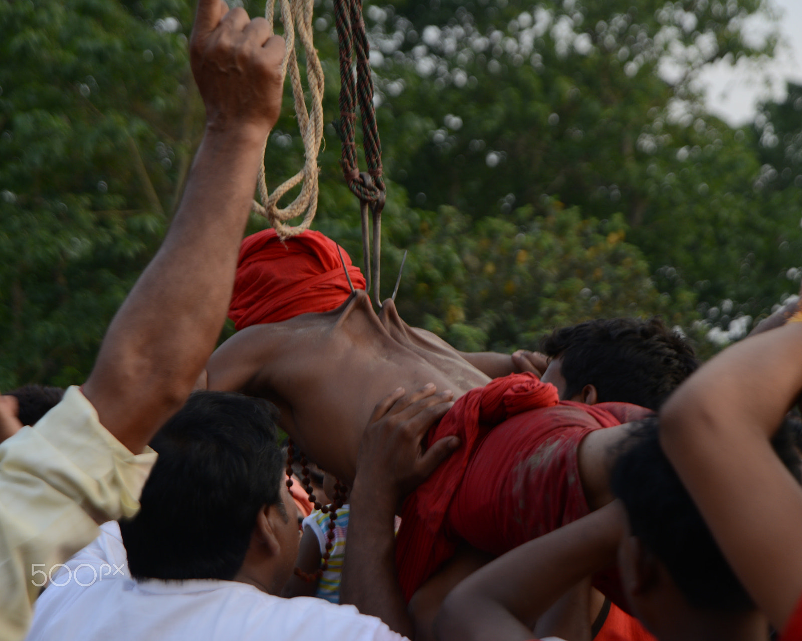 Nikon D800E + Nikon AF Nikkor 24-85mm F2.8-4D IF sample photo. Man held himself on hook charak festival west bengal india photography