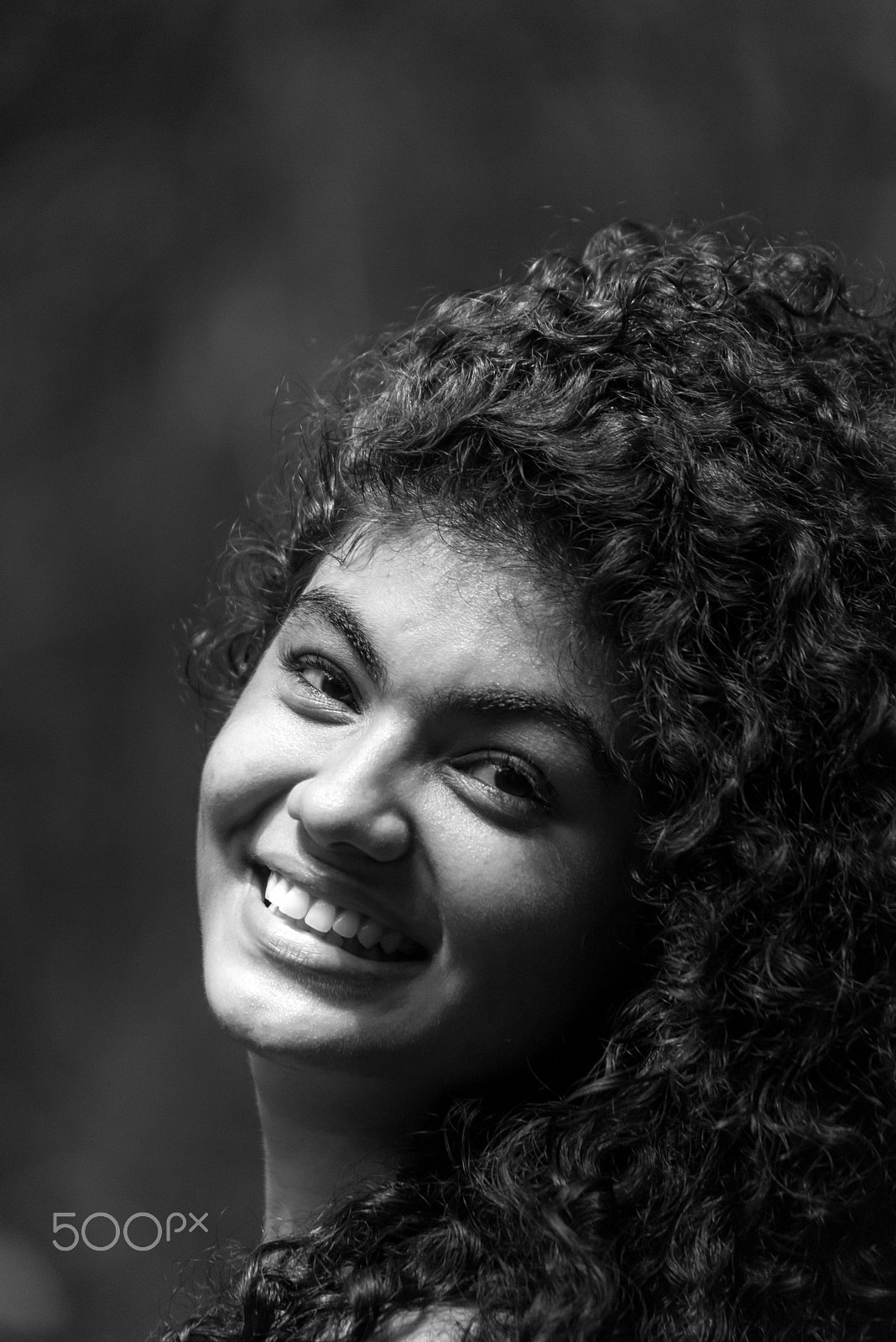 Sigma 50-500mm F4.5-6.3 DG OS HSM sample photo. Curly smile... photography