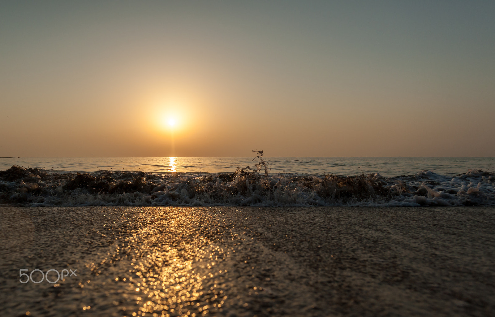 Nikon D700 sample photo. Ocean waves in light of a rising sun  / photography