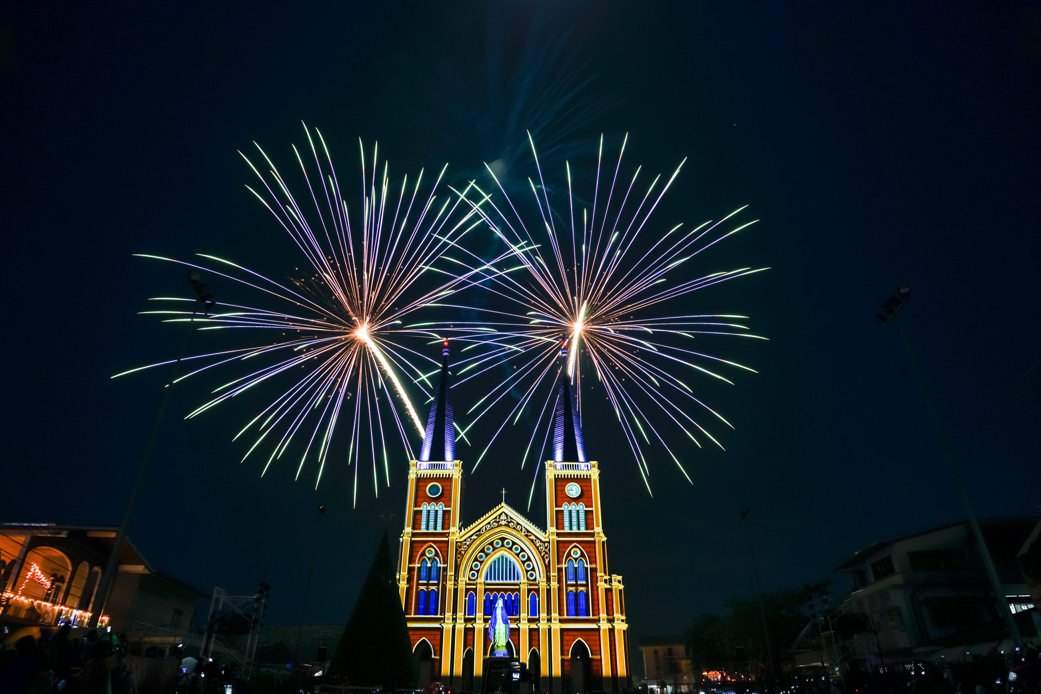 Sony a7 II + FE 21mm F2.8 sample photo. Colorful firework with virgin mary in the christmas night photography