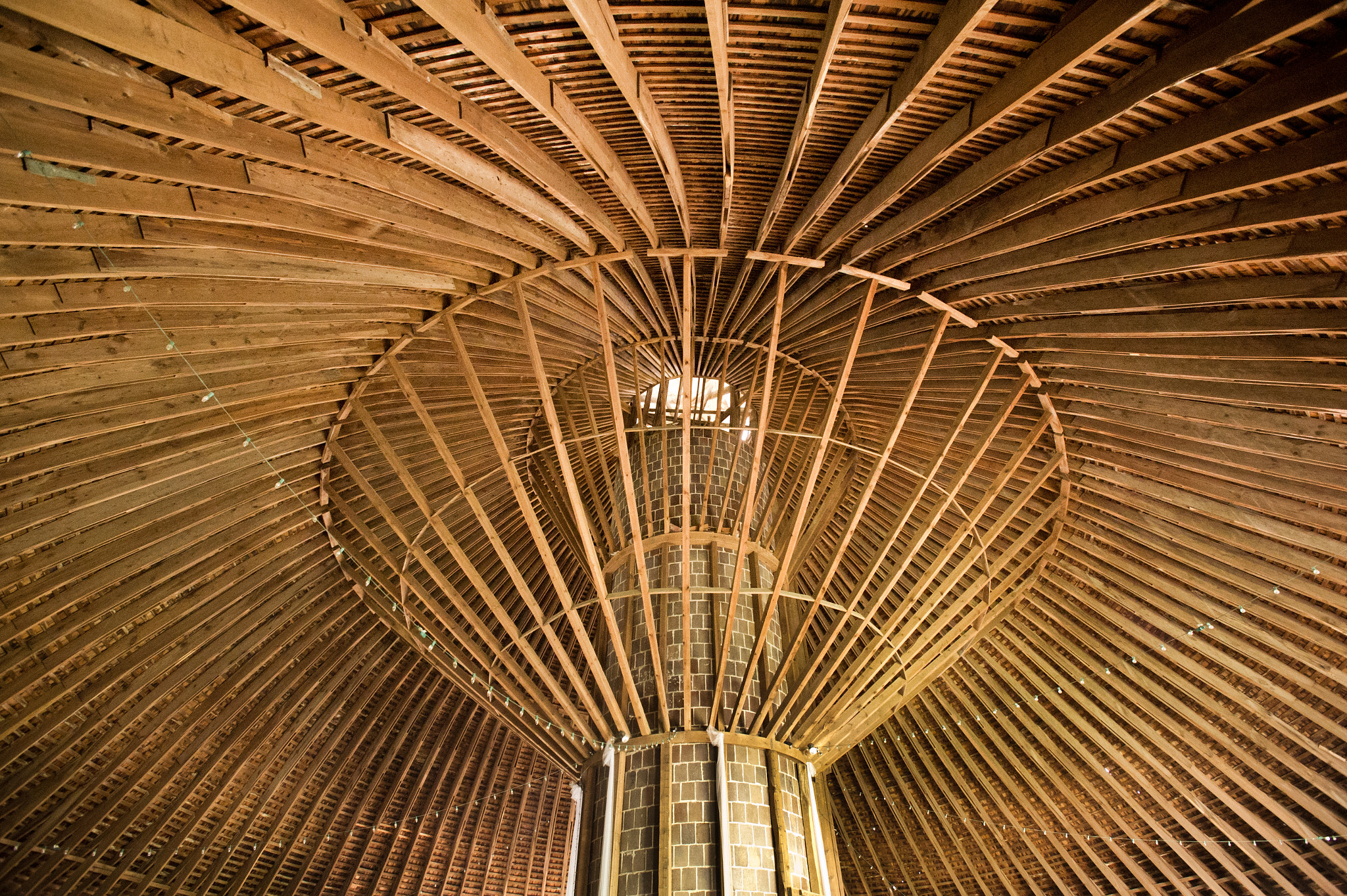 Nikon AF-S Nikkor 17-35mm F2.8D ED-IF sample photo. Interior of round barn photography