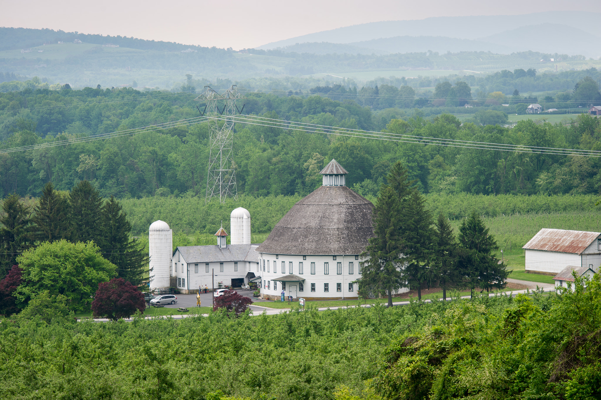 Nikon D3S sample photo. Round barn in field photography