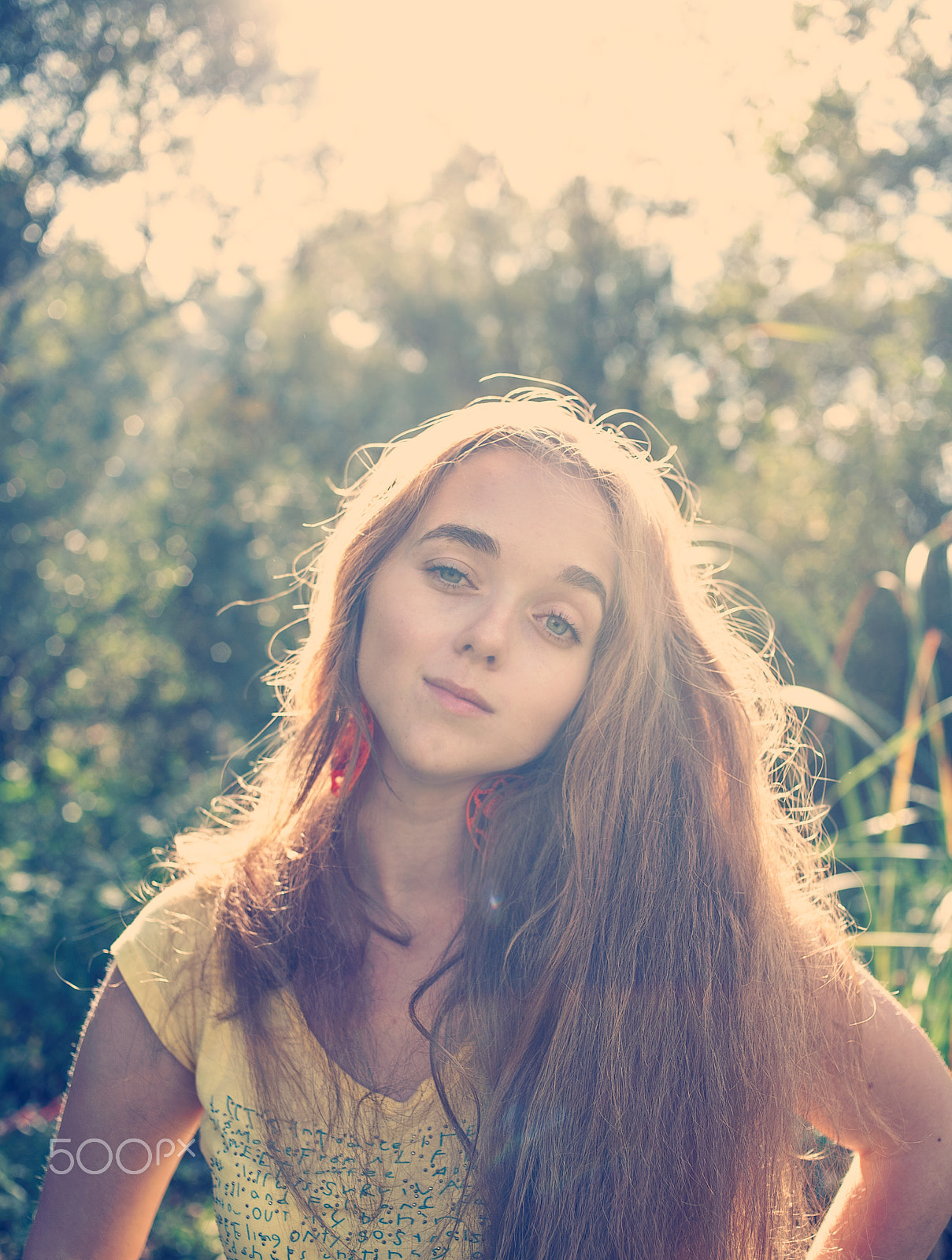 Canon EOS 5D + Canon EF 35mm F2 sample photo. Long haired girl posing in the park retro toned image photography