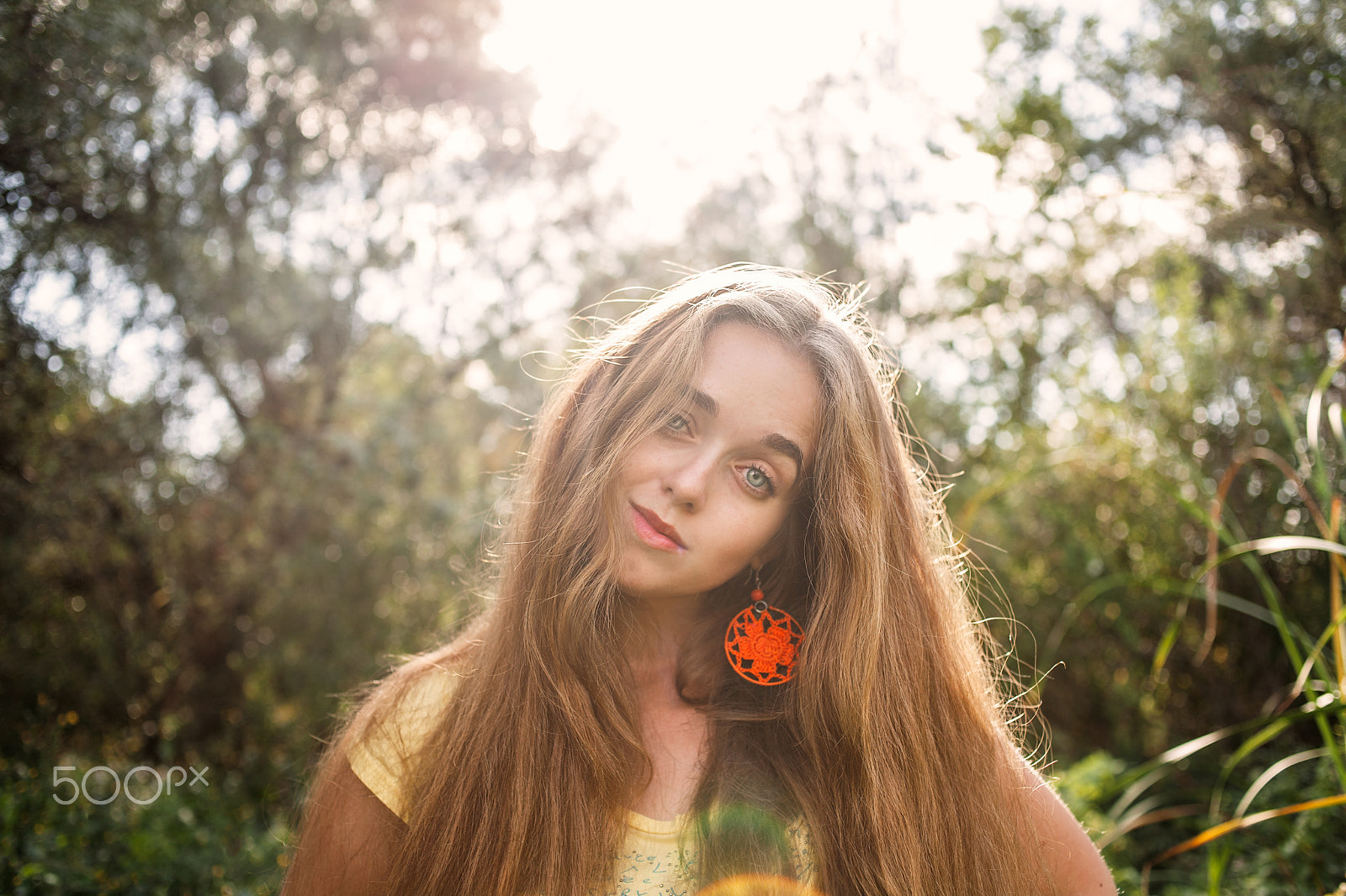 Canon EOS 5D + Canon EF 35mm F2 sample photo. Bohemian style girl with long blond hair posing in front of high trees in a park retro color... photography