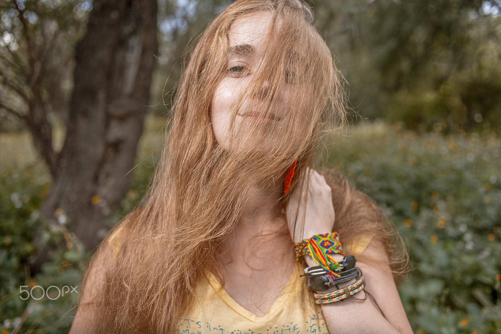 Canon EOS 5D + Canon EF 35mm F2 sample photo. Attractive long haired blond girl boho style bracelets hide half of her face by hair photography