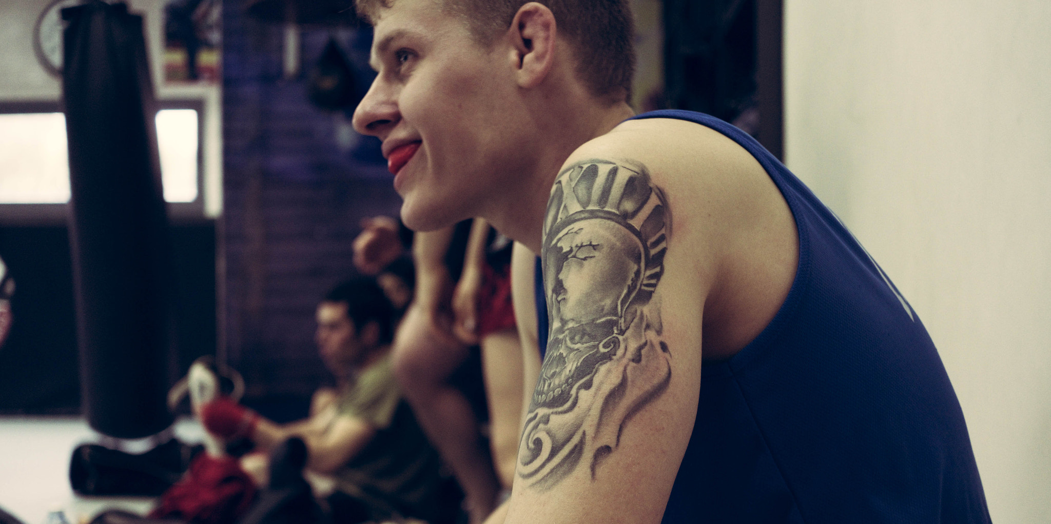Fujifilm X-T10 + Fujifilm XF 27mm F2.8 sample photo. Guy with tattoo photography
