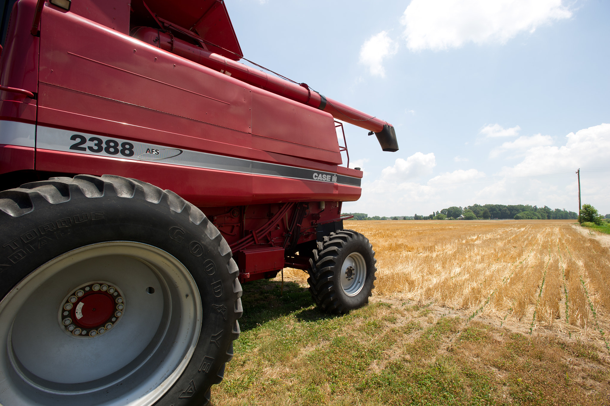 Nikon AF-S Nikkor 17-35mm F2.8D ED-IF sample photo. Grain production machinery on farm photography