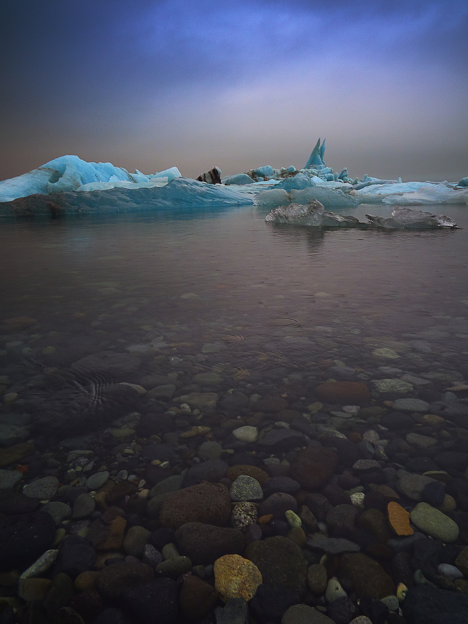 Olympus M.Zuiko Digital ED 12-100mm F4.0 IS Pro sample photo. Ice and pebbles photography