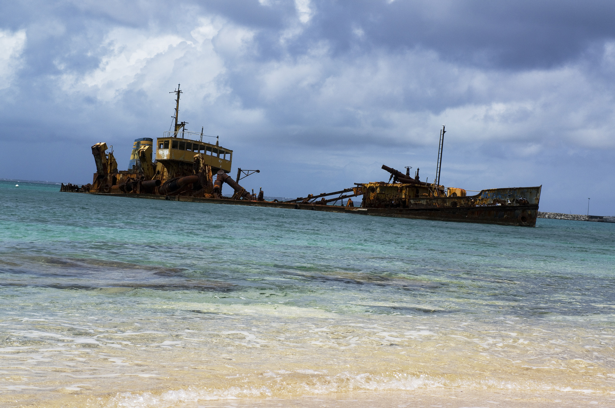 Sony Alpha NEX-5R + Sony E 18-55mm F3.5-5.6 OSS sample photo. Hurricane shipwreck photography