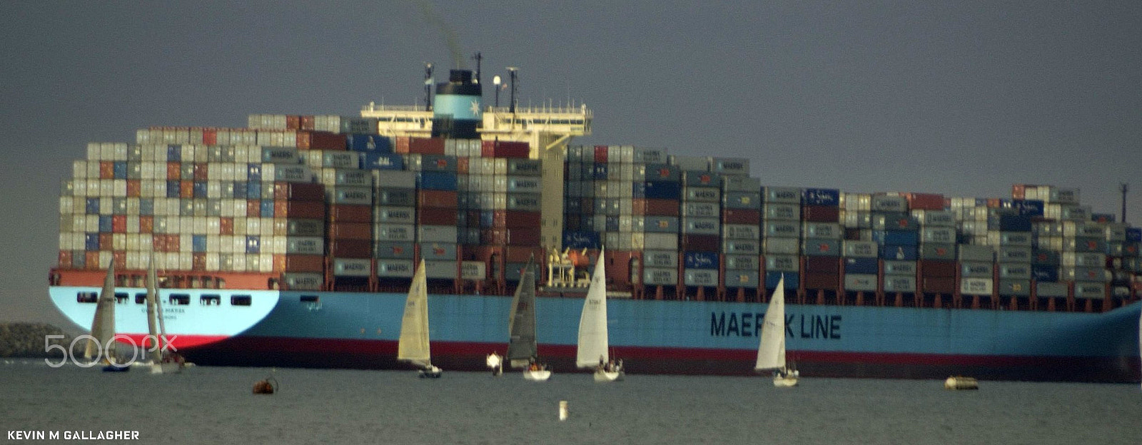 Nikon D70s sample photo. Cargo ship and sailboats o photography