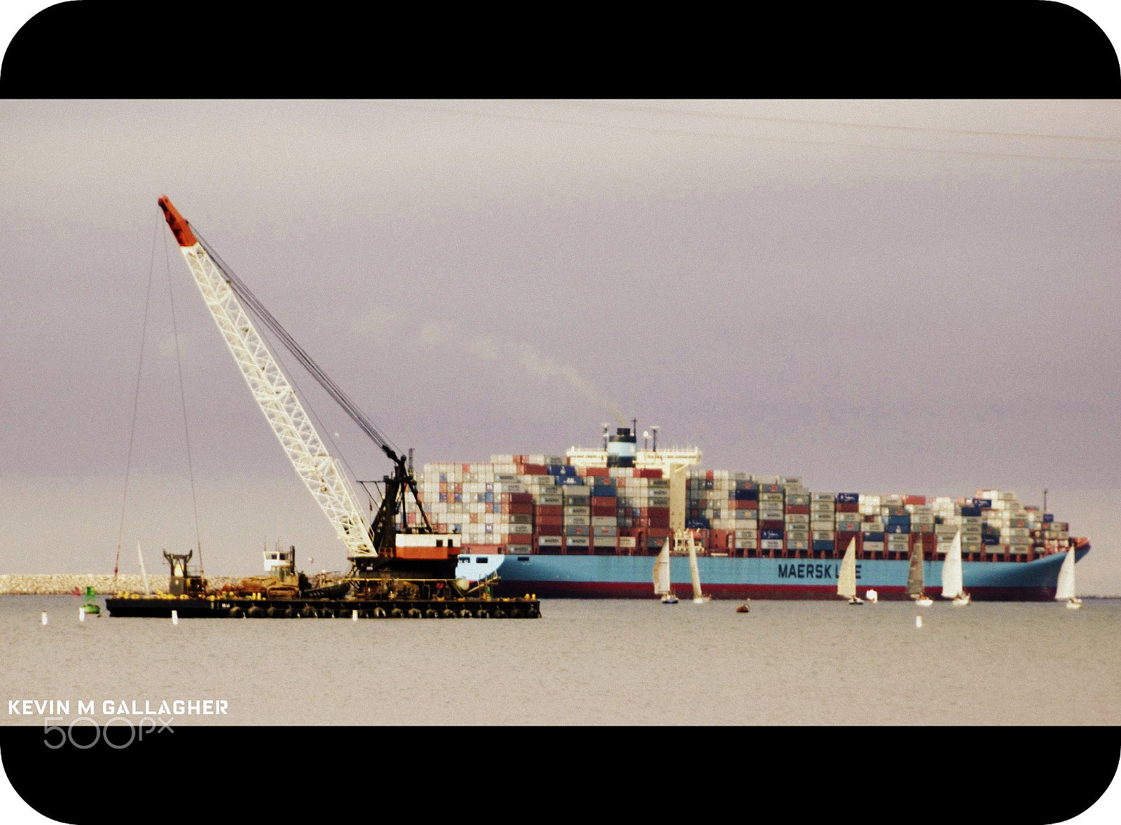 Nikon D70s + Tamron AF 28-300mm F3.5-6.3 XR Di LD Aspherical (IF) Macro sample photo. Cargo ship sailboats and a crane o photography