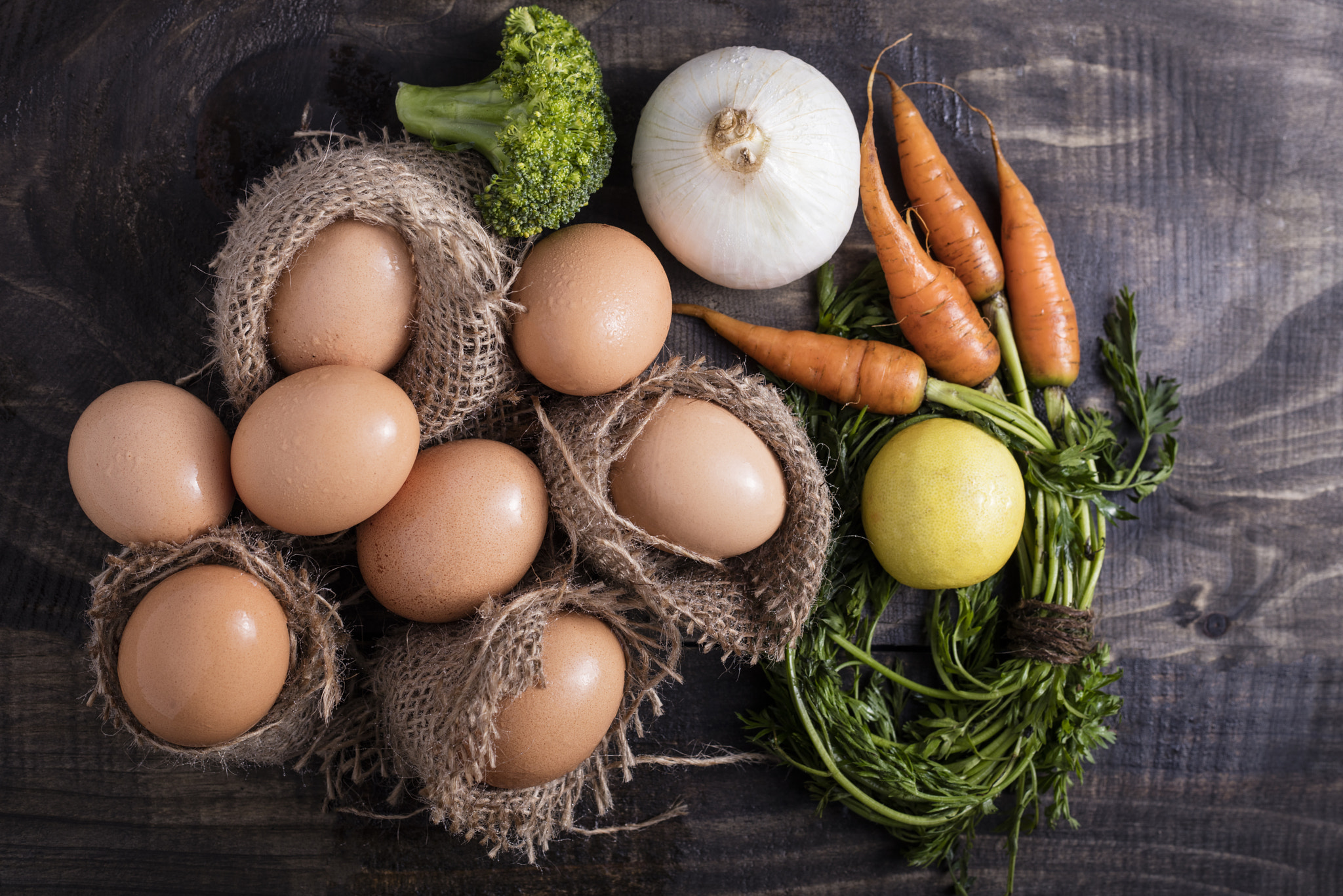 Canon EOS 5DS R sample photo. Brown eggs draped in jute bags photography