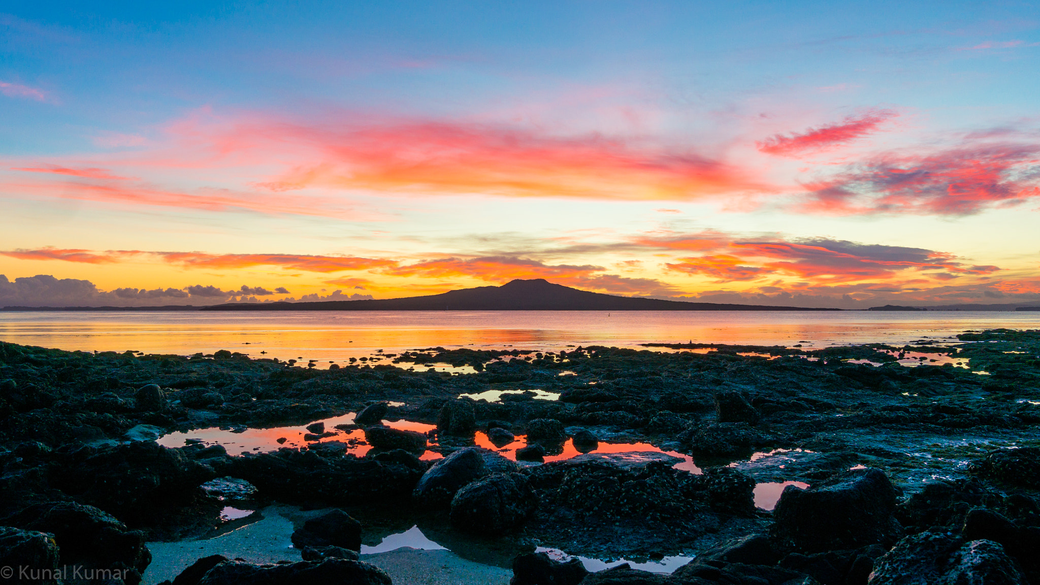 Sony Alpha NEX-5R + Sony E 10-18mm F4 OSS sample photo. Sun rising volcano photography