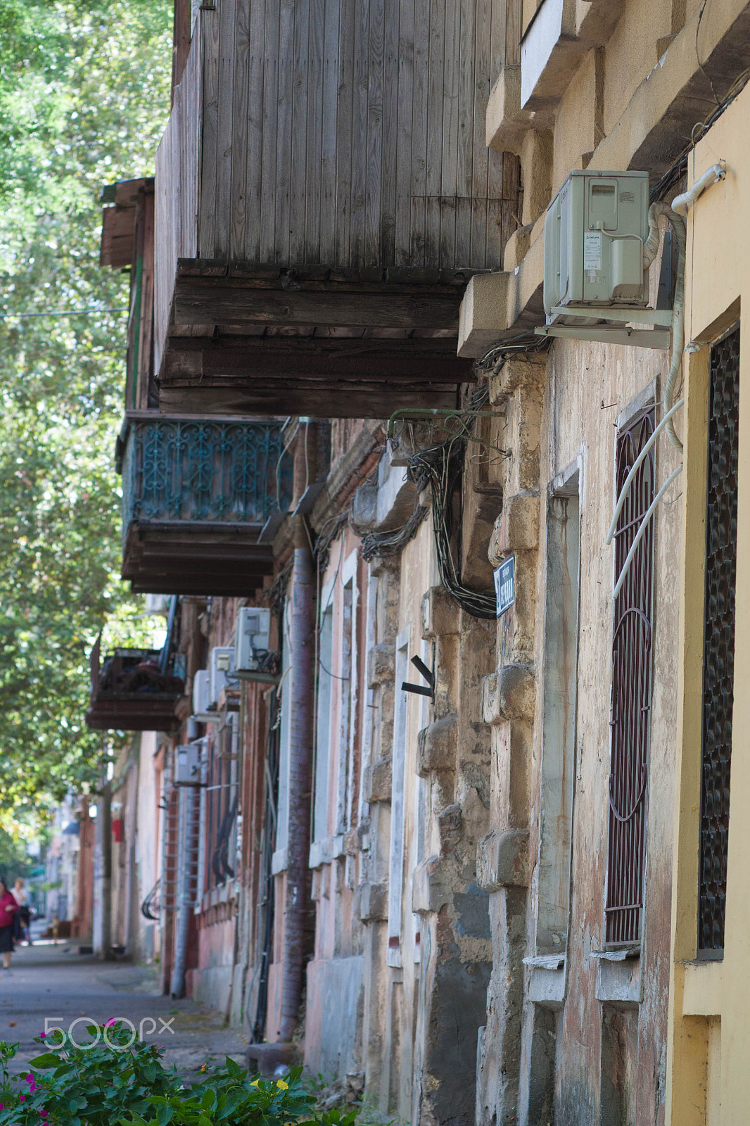 Canon EF 35-80mm f/4-5.6 sample photo. The wall from buildings photography