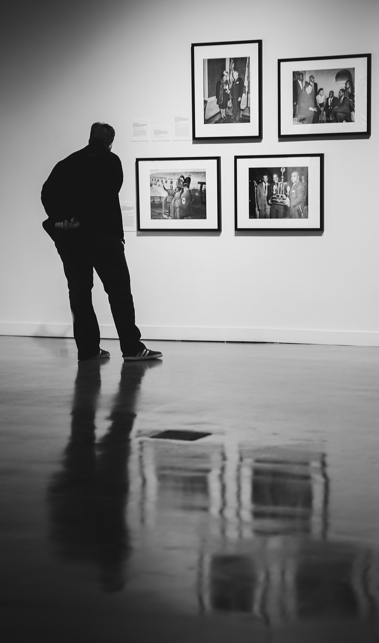 ZEISS Batis 85mm F1.8 sample photo. Man in reflection photography