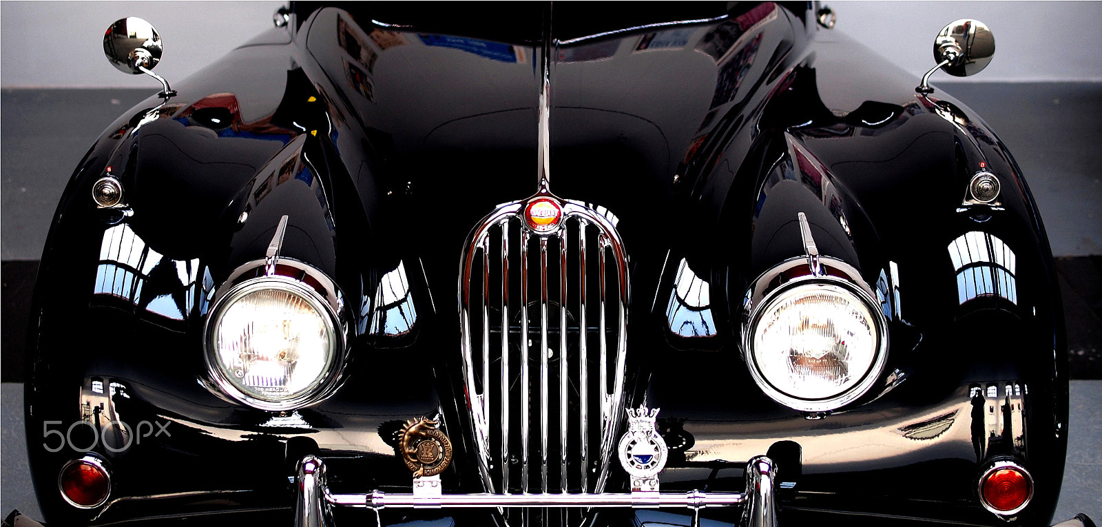 Olympus PEN E-P2 sample photo. Jaguar reflections photography