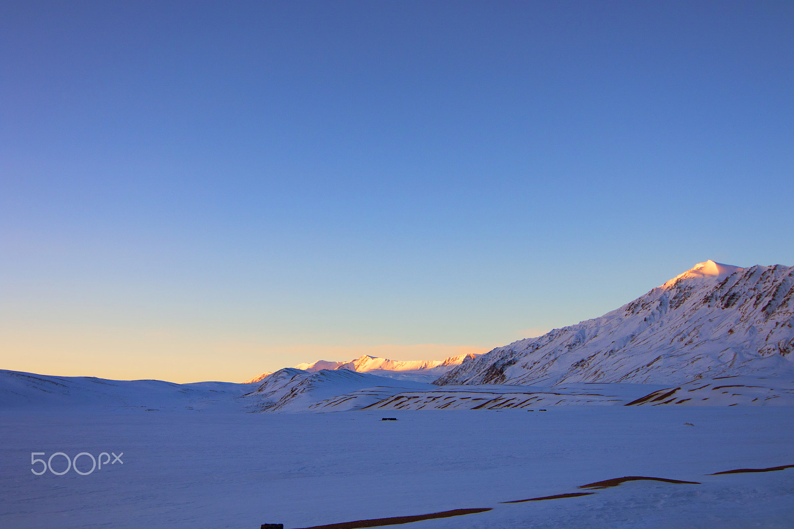 Tokina AT-X 12-28mm F4 Pro DX sample photo. First sunrays over snow capped mountains photography